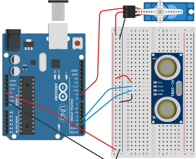 Laboratório 7 — Lixeira automática com Arduino Uno, sensor HC-SR04 e Micro Servo, utilizando a protoboard para distribuir 5V e GND.